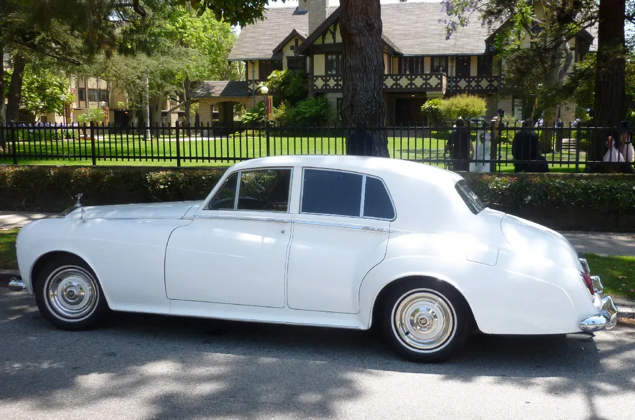 White 1960 Rolls-Royce Silver Cloud II exterior, photo 6 for wedding car rental in Los Angeles County, CA White 1960 Rolls-Royce Silver Cloud II exterior, photo 6 for wedding car rental in Los Angeles County, CA