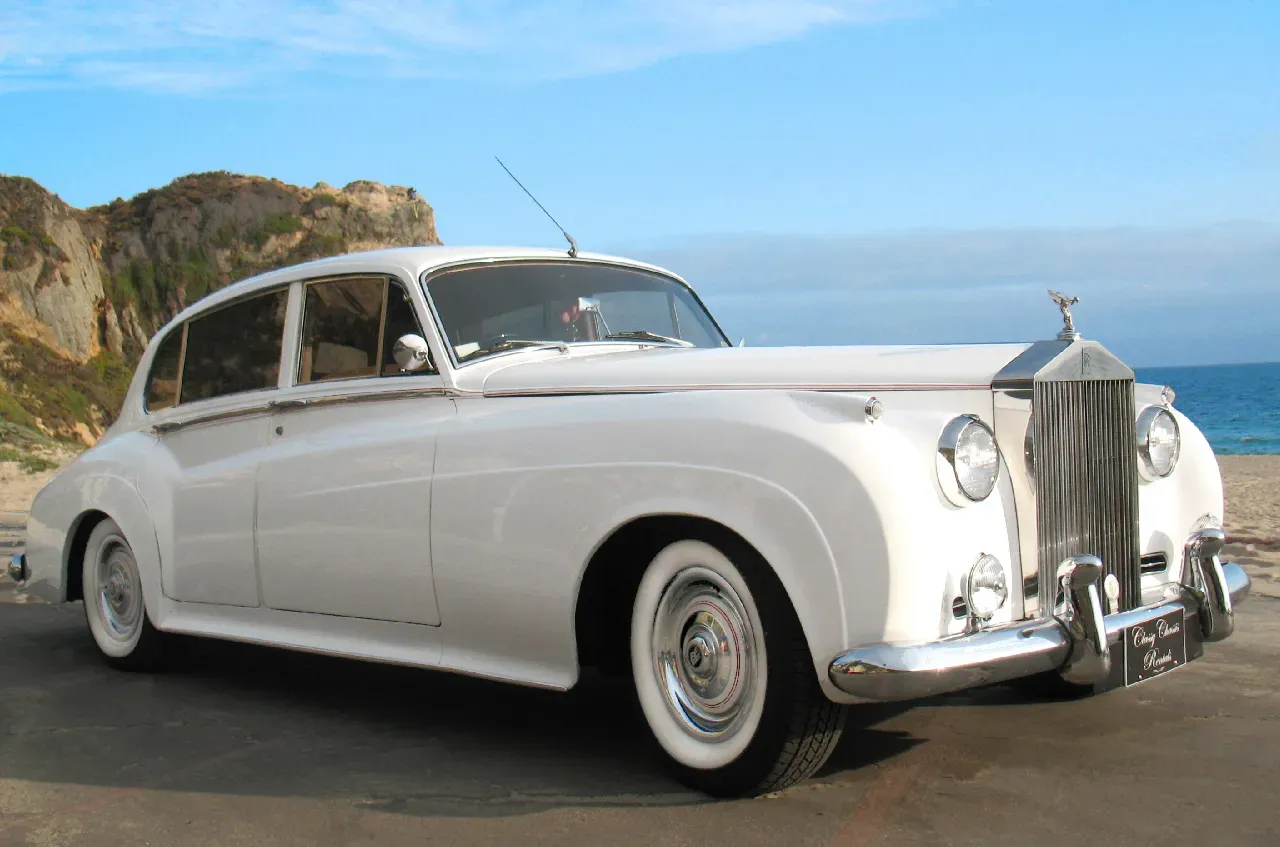 White 1962 Rolls-Royce Silver Cloud II LWB exterior, photo 4 for wedding car rental in Tarzana, CA White 1962 Rolls-Royce Silver Cloud II LWB exterior, photo 4 for wedding car rental in Tarzana, CA