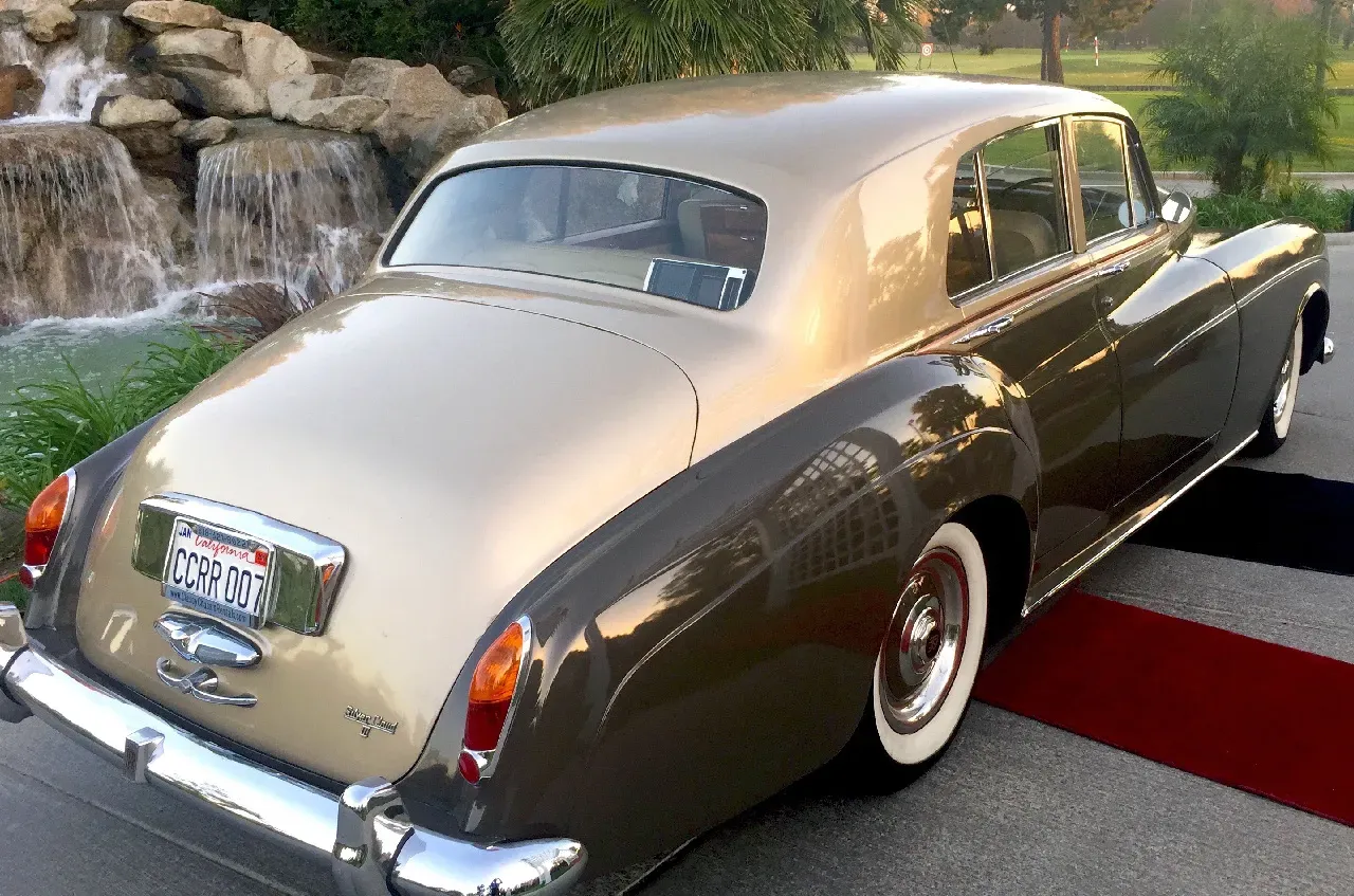 Gray 1963 Rolls-Royce Silver Cloud III exterior, photo 5 for Rolls-Royce car rental in Tarzana, CA