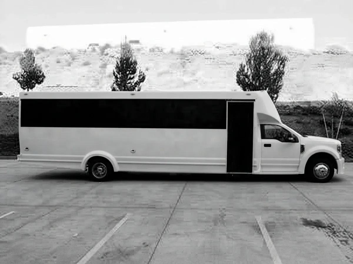 White 2019 Ford F550 30 Passenger Luxury Limousine Bus for party bus rental