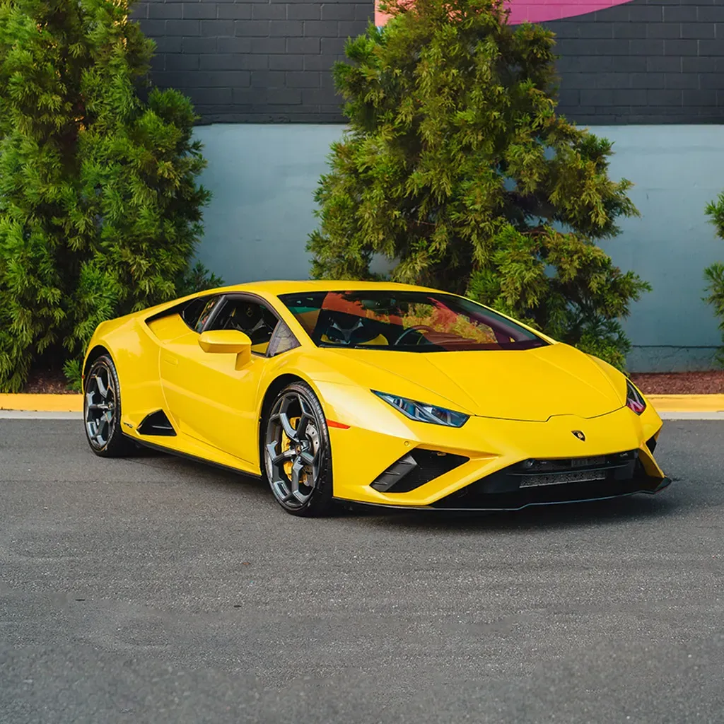 Gold 2022 Lamborghini Huracan EVO Giallo Orion for exotic car rental
