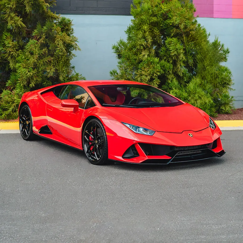 Red 2022 Lamborghini Huracan EVO Rosso Mars for exotic car rental in Forsyth County, GA
