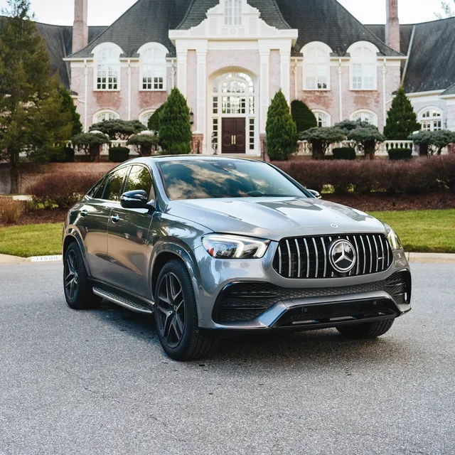Silver 2023 AMG GLE53 Sport Coupe for airport transfers