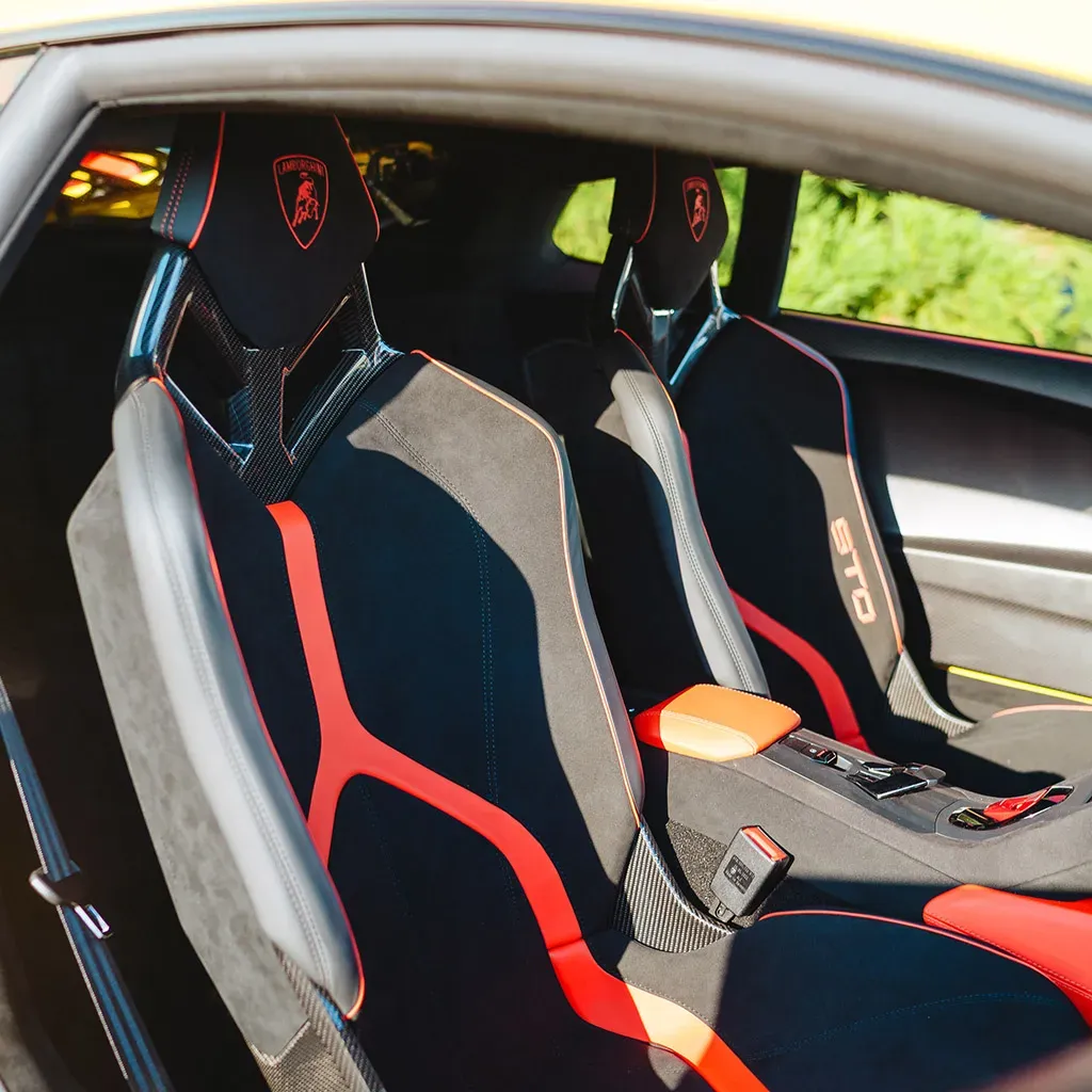 Orange 2023 Lamborghini Super Trofeo Omologata, photo 8 for exotic car rental in Rockville, MD Orange 2023 Lamborghini Super Trofeo Omologata, photo 8 for exotic car rental in Rockville, MD