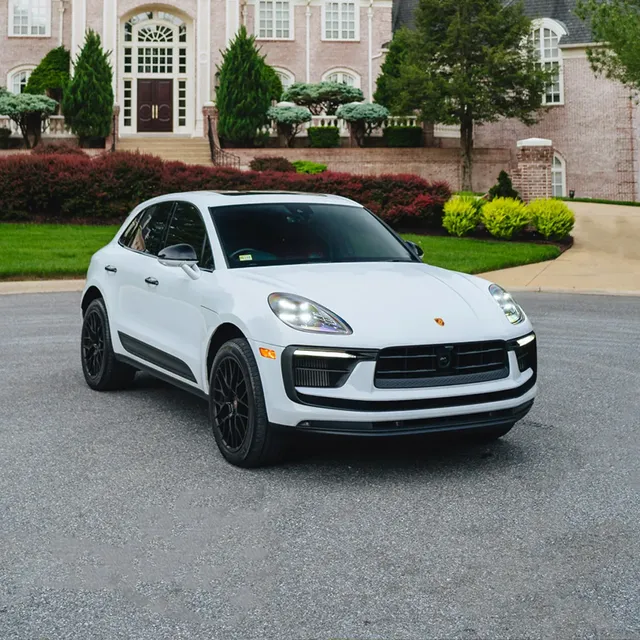White 2023 Porsche Macan S SUV for airport transfers