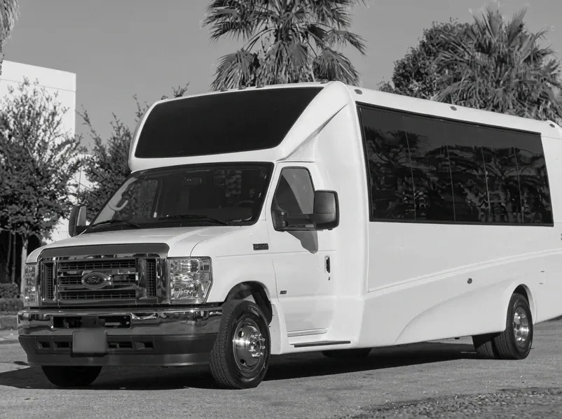 White 23 Passenger 2025 E-450 Luxury Coach for minibus rental