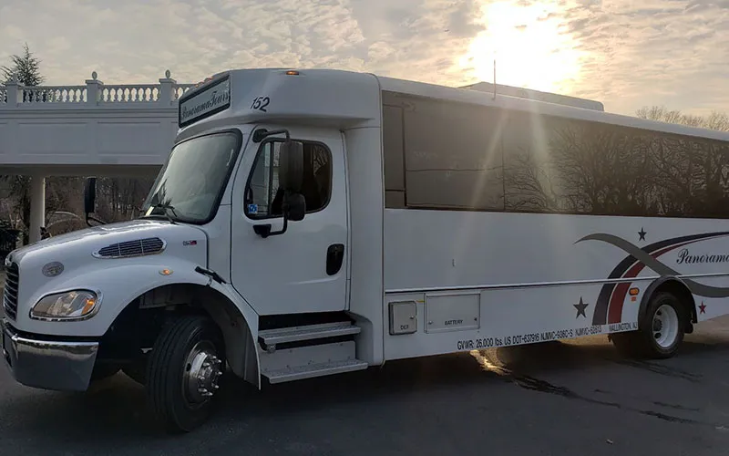 White 26 Passenger Luxury Coach for mini coach rental in Tenafly, NJ