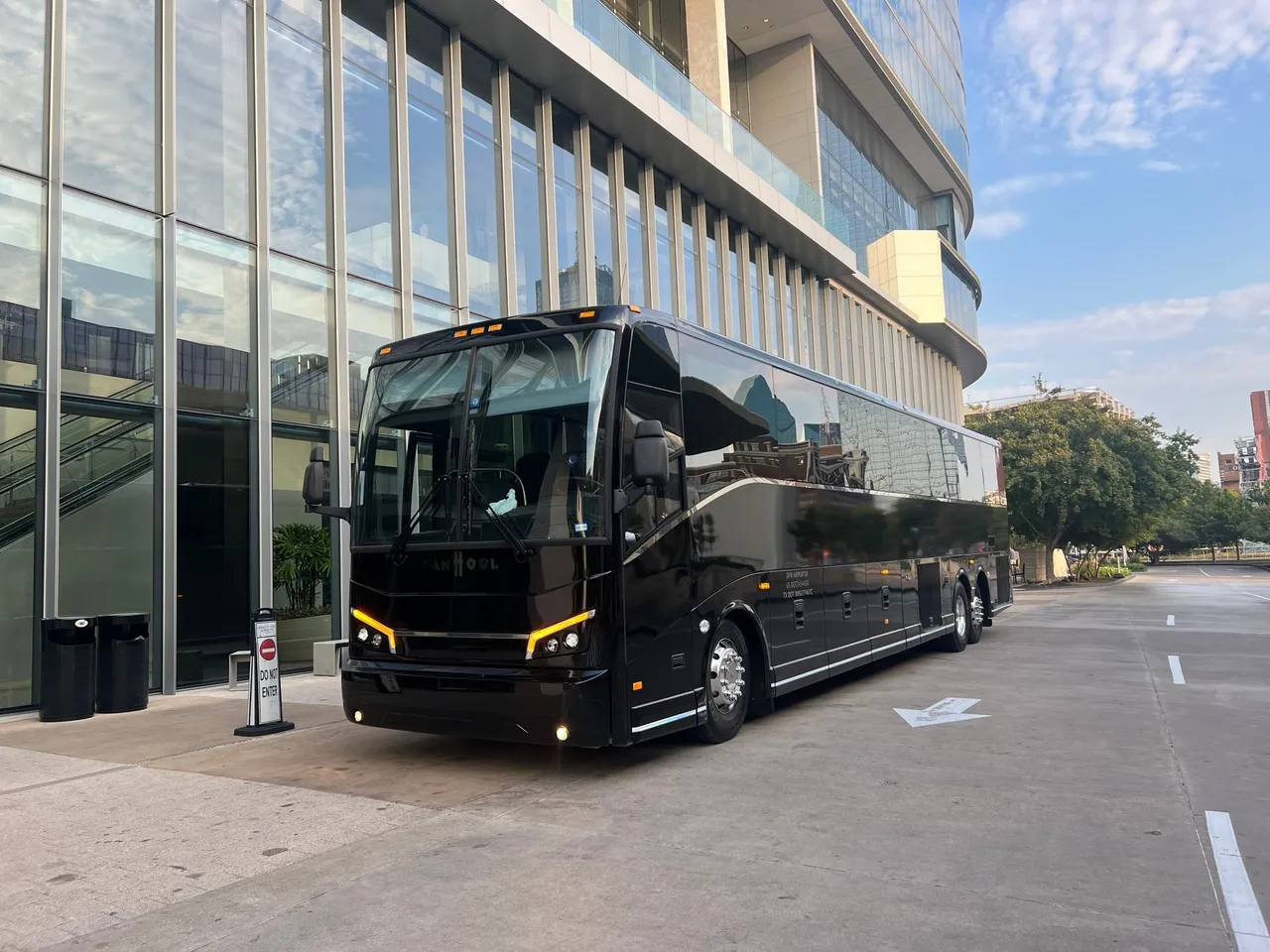 Black 56 Passenger Motorcoach for charter bus rental in Agua Dulce, TX