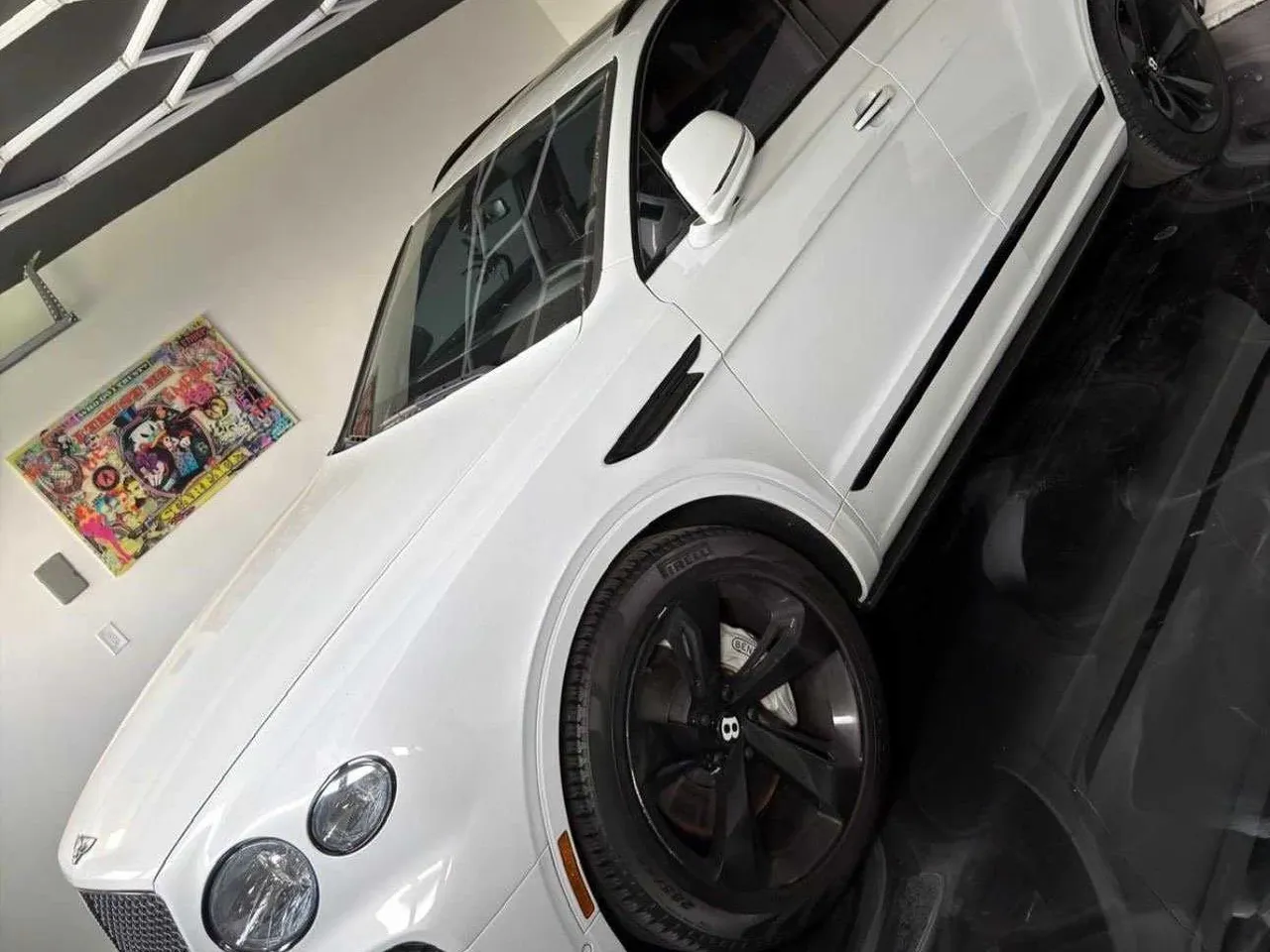 White Bentley Bentayga Speed for airport transfers