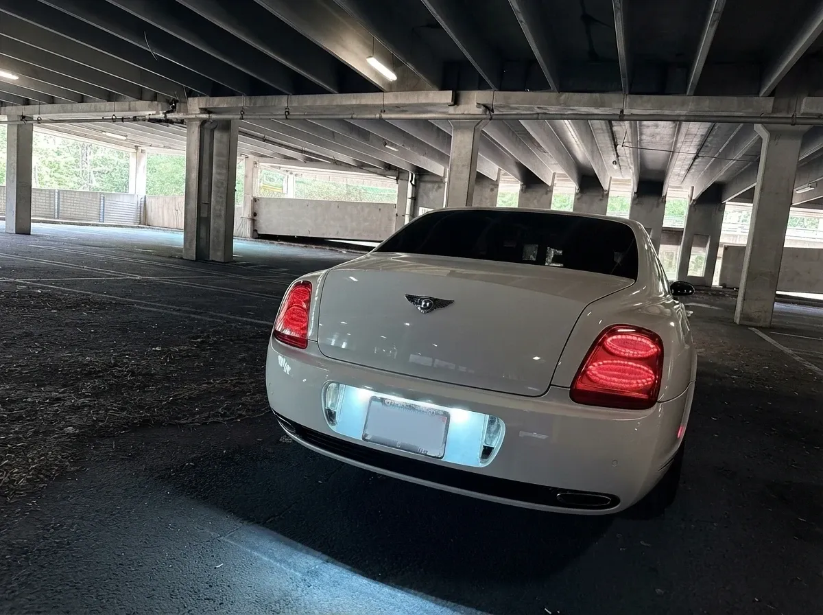 White Bentley Continental Flying Spur, photo 7 for quinceanera transportation in North Attleboro, MA