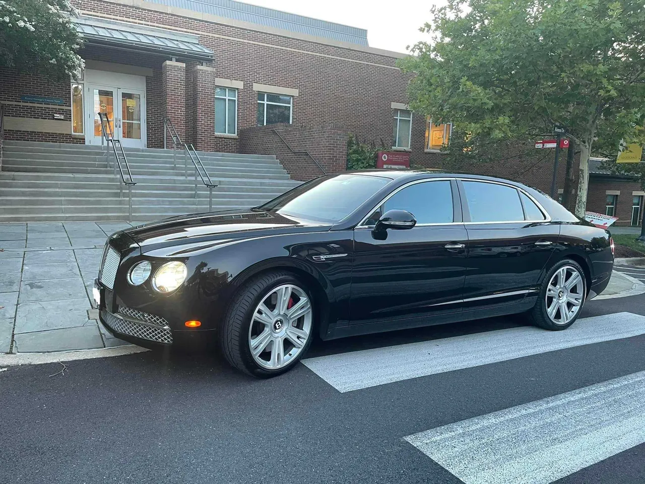 Black Bentley Flying Spur exterior, photo 2 for luxury car rental