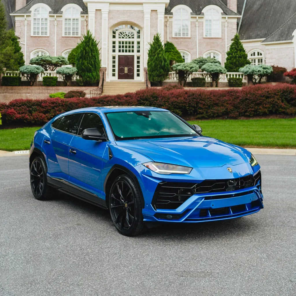 Blue Blu Eleos Lamborghini Urus for airport transfers