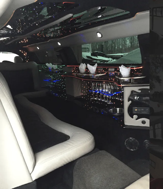 C300 Limousine interior with LED accent lighting, starlight or fiber-optic ceiling and bar area for limo rental in North Dakota