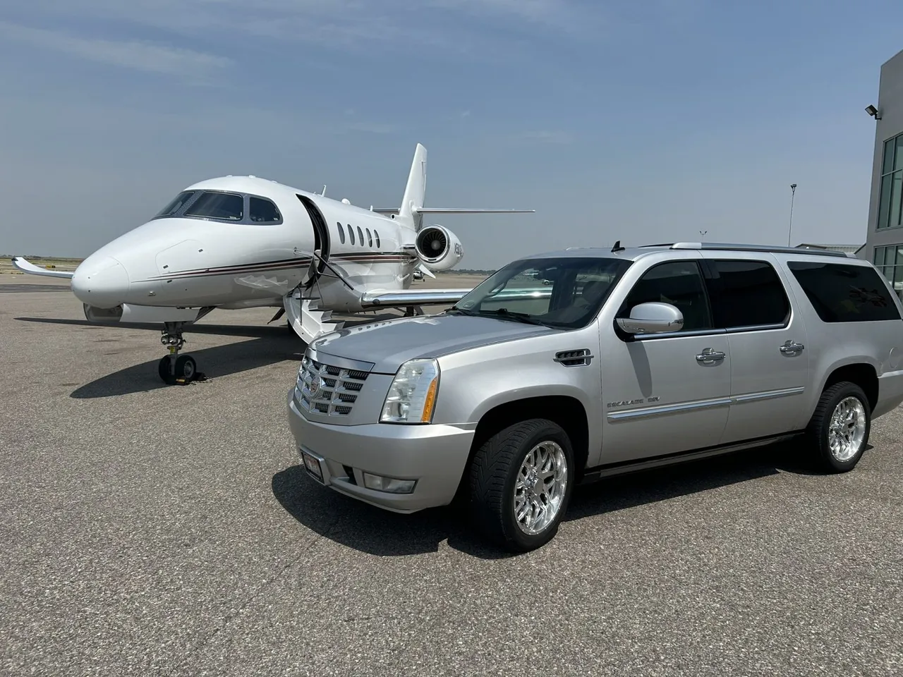 Silver Caddilac Escalade for airport transfers in Idaho Falls, ID Silver Caddilac Escalade for airport transfers in Idaho Falls, ID