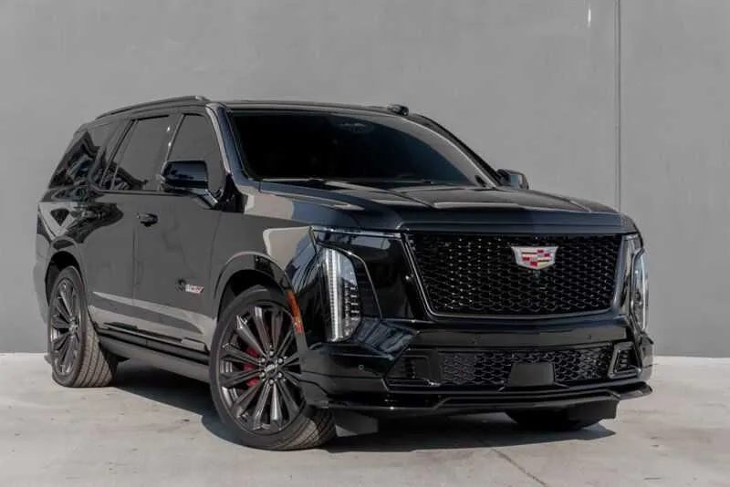Black Cadillac Escalade with tinted windows for black car service in Portland, OR