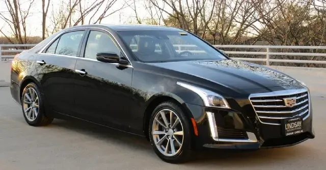 Black Cadillac CTS for sedan rental in Haubstadt, IN
