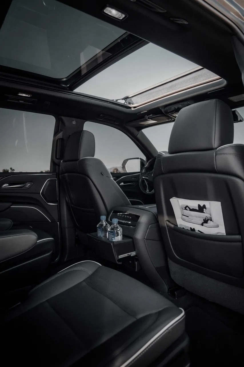 Cadillac Escalade interior with cup holders for airport transfers Cadillac Escalade interior with cup holders for airport transfers