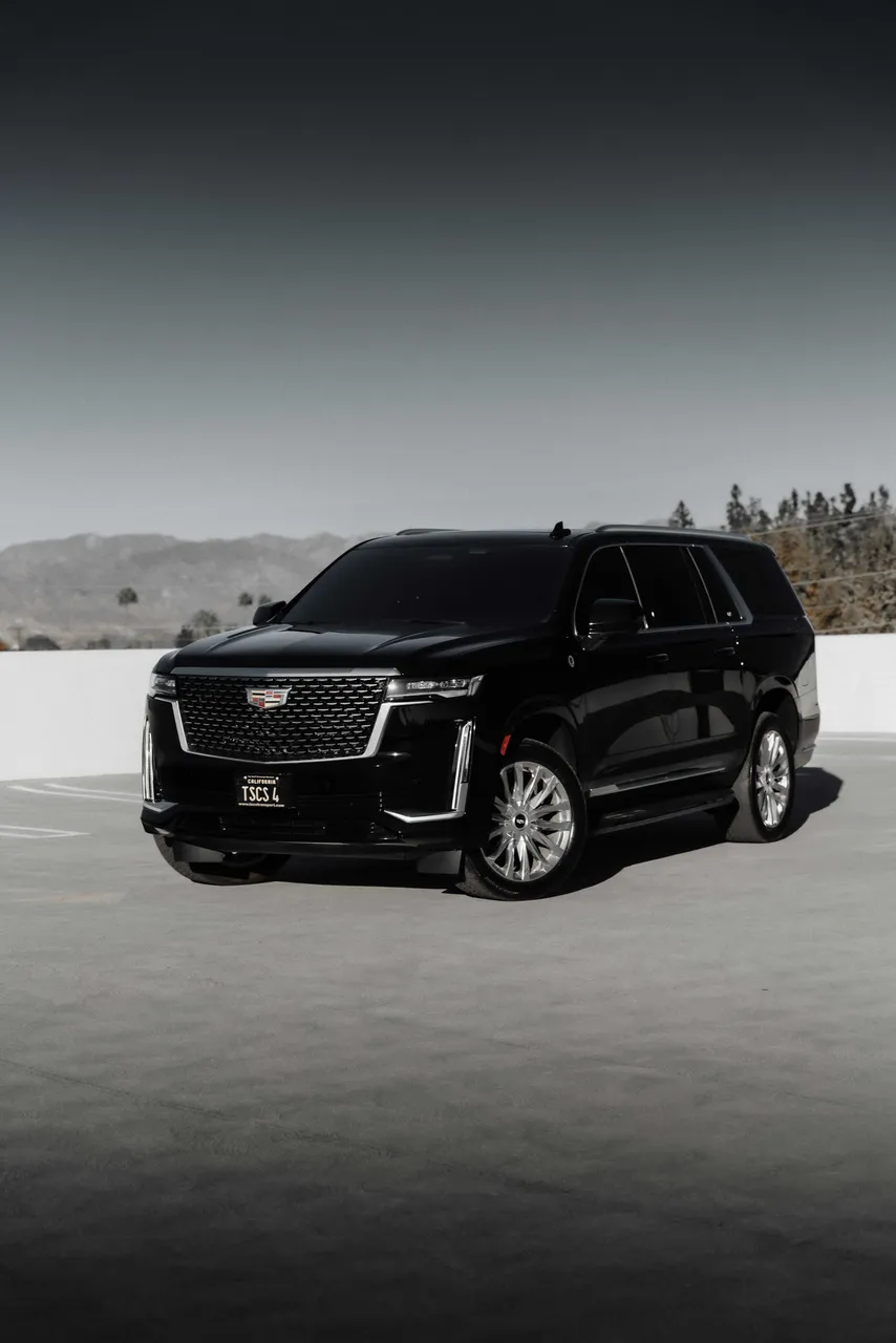 Black Cadillac Escalade exterior for airport transfers Black Cadillac Escalade exterior for airport transfers