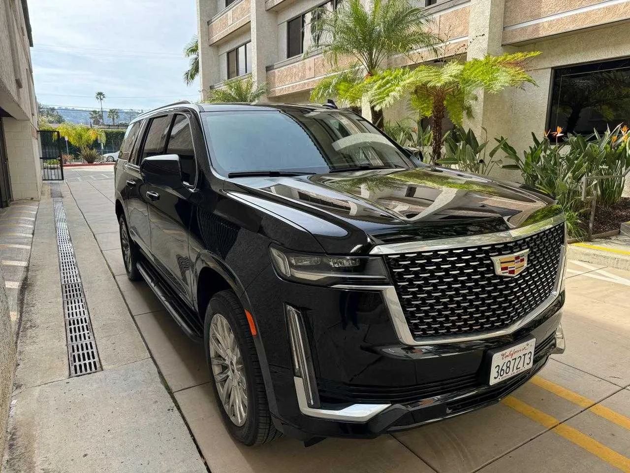 Black Cadillac Escalade exterior with running boards, photo 3 for airport transfers in Malibu, CA