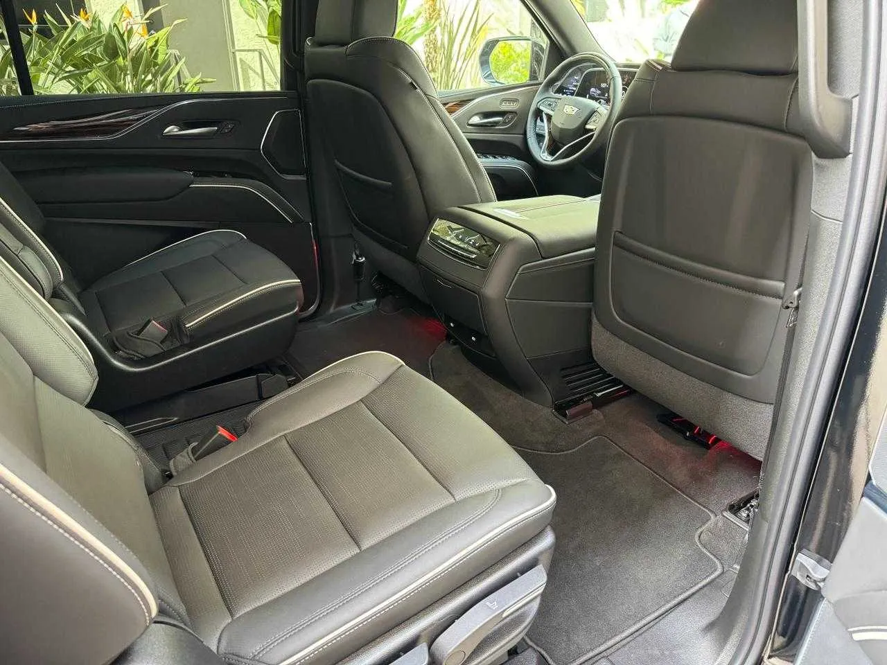 Cadillac Escalade interior with captain's chairs for airport transfers in Malibu, CA