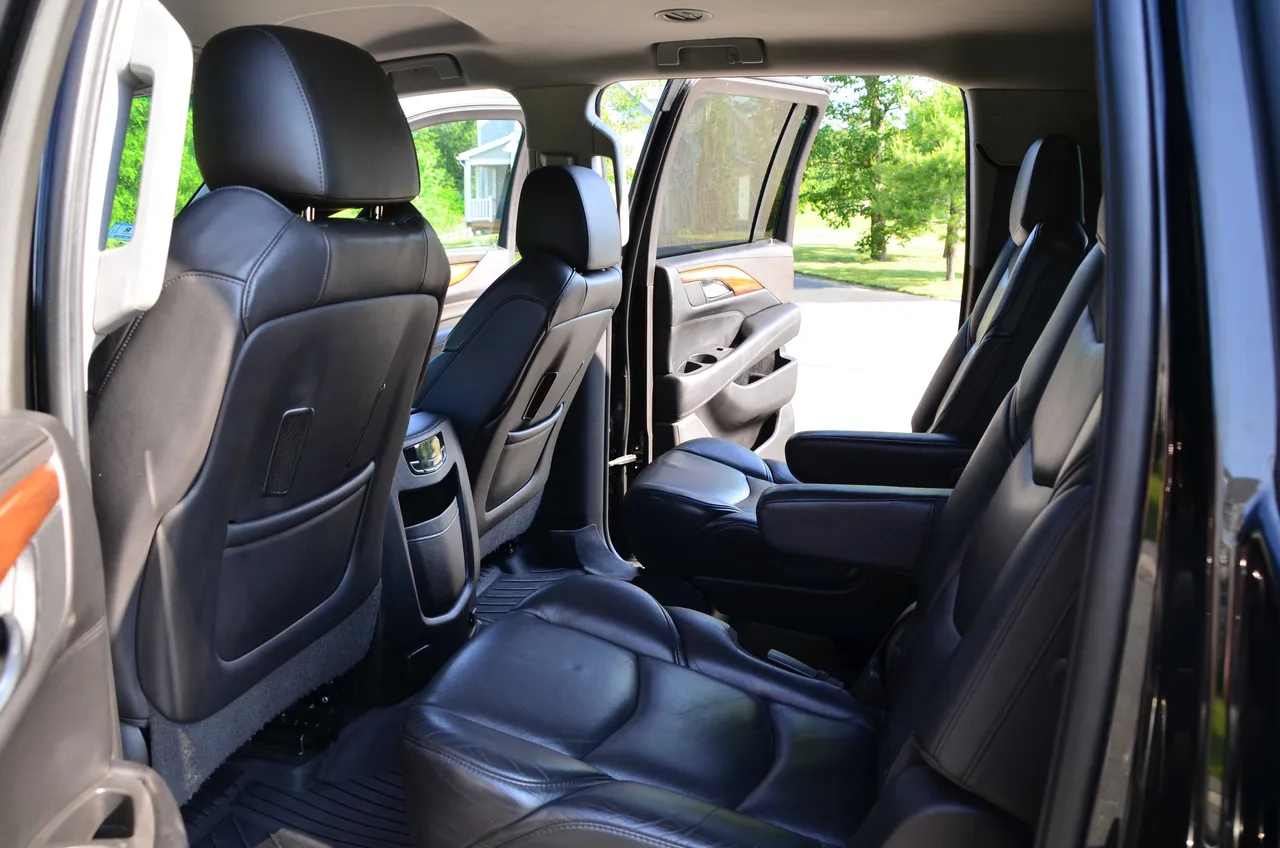 Cadillac Escalade interior with captain's chairs for cadillac escalade limo in Marlborough, MA