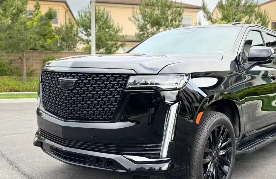 Black Cadillac Escalade with running boards for cadillac escalade limo in Beverly Hills, CA