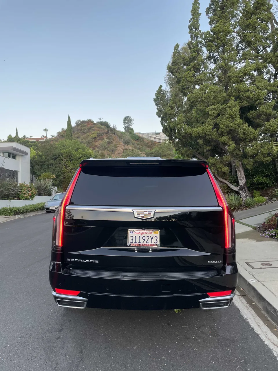 Black Cadillac Escalade exterior with tinted windows for cadillac escalade limo in Beverly Hills, CA