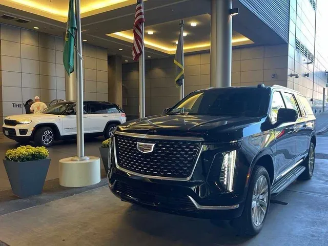 Black Cadillac Escalade with running boards for cadillac escalade limo in Seattle, WA