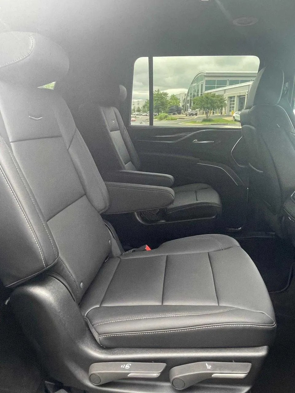 Cadillac Escalade interior with captain's chairs for airport transfers