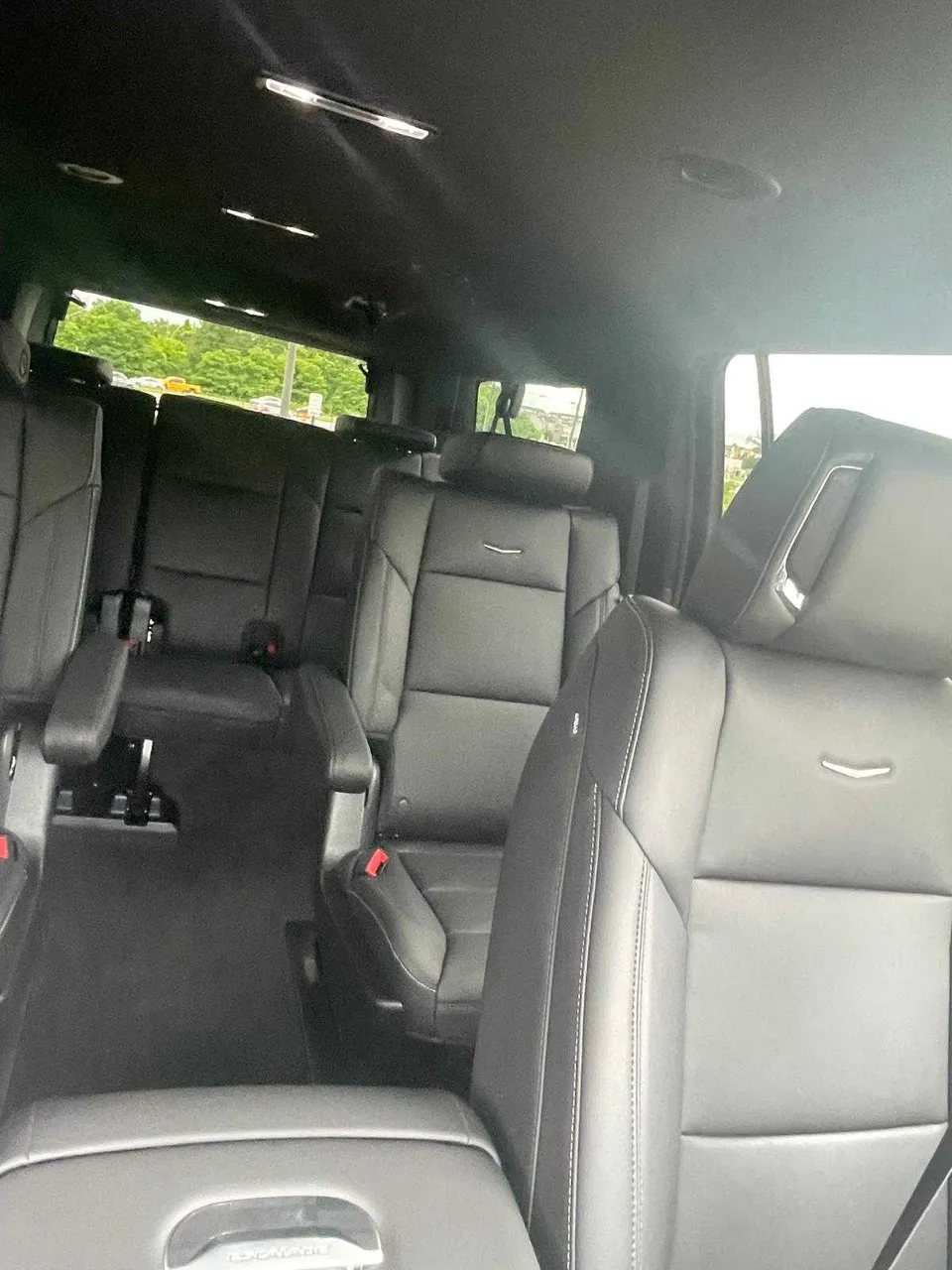 Cadillac Escalade interior with captain's chairs for airport transfers