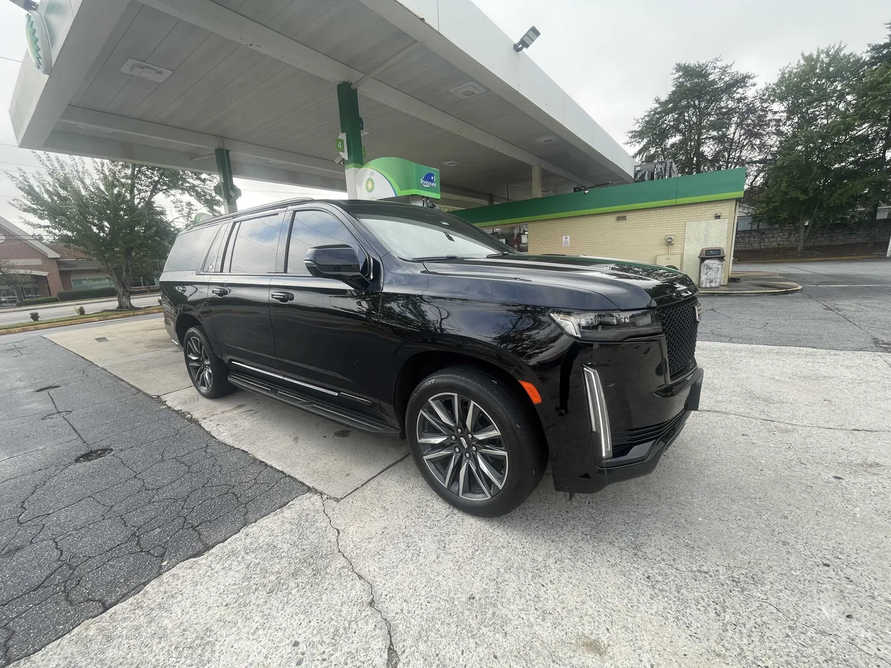 Black Cadillac Escalade with running boards for cadillac escalade limo in Atlanta, GA Black Cadillac Escalade with running boards for cadillac escalade limo in Atlanta, GA