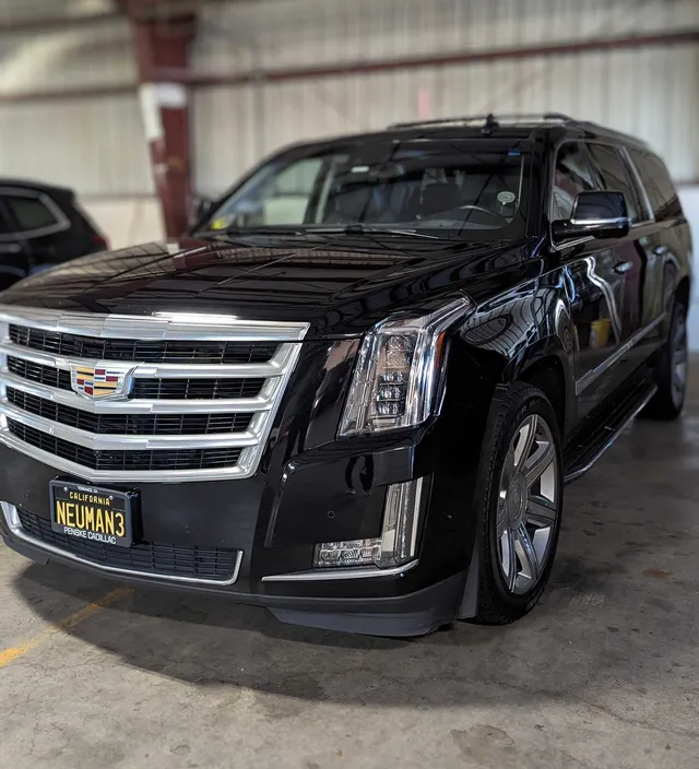 Black Cadillac Escalade exterior with running boards for cadillac escalade limo in El Dorado County, CA Black Cadillac Escalade exterior with running boards for cadillac escalade limo in El Dorado County, CA