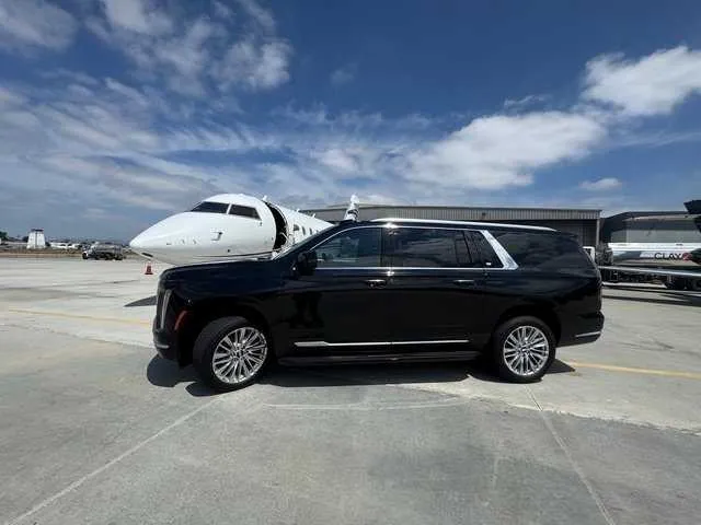 Black Cadillac Escalade exterior for black car service in Los Angeles County, CA Black Cadillac Escalade exterior for black car service in Los Angeles County, CA