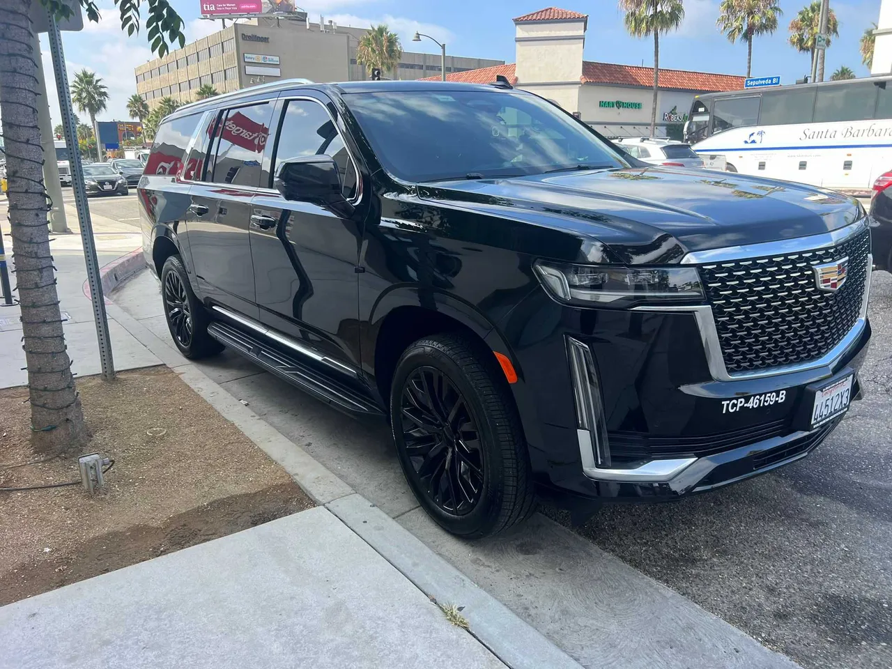 Black Cadillac Escalade exterior with running boards for cadillac escalade limo in Hawaiian Gardens, CA Black Cadillac Escalade exterior with running boards for cadillac escalade limo in Hawaiian Gardens, CA