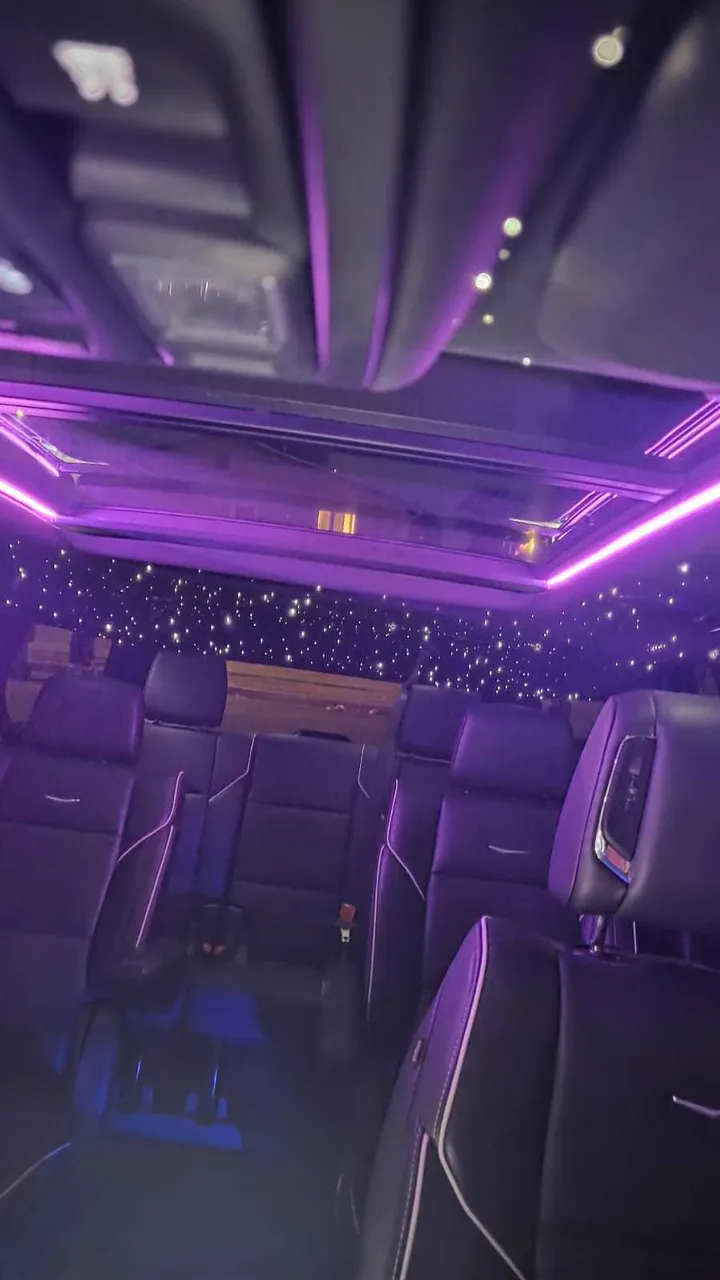 Cadillac escalade interior with LED accent lighting and starlight or fiber-optic ceiling, photo 3 for airport transfers in Summerland, CA