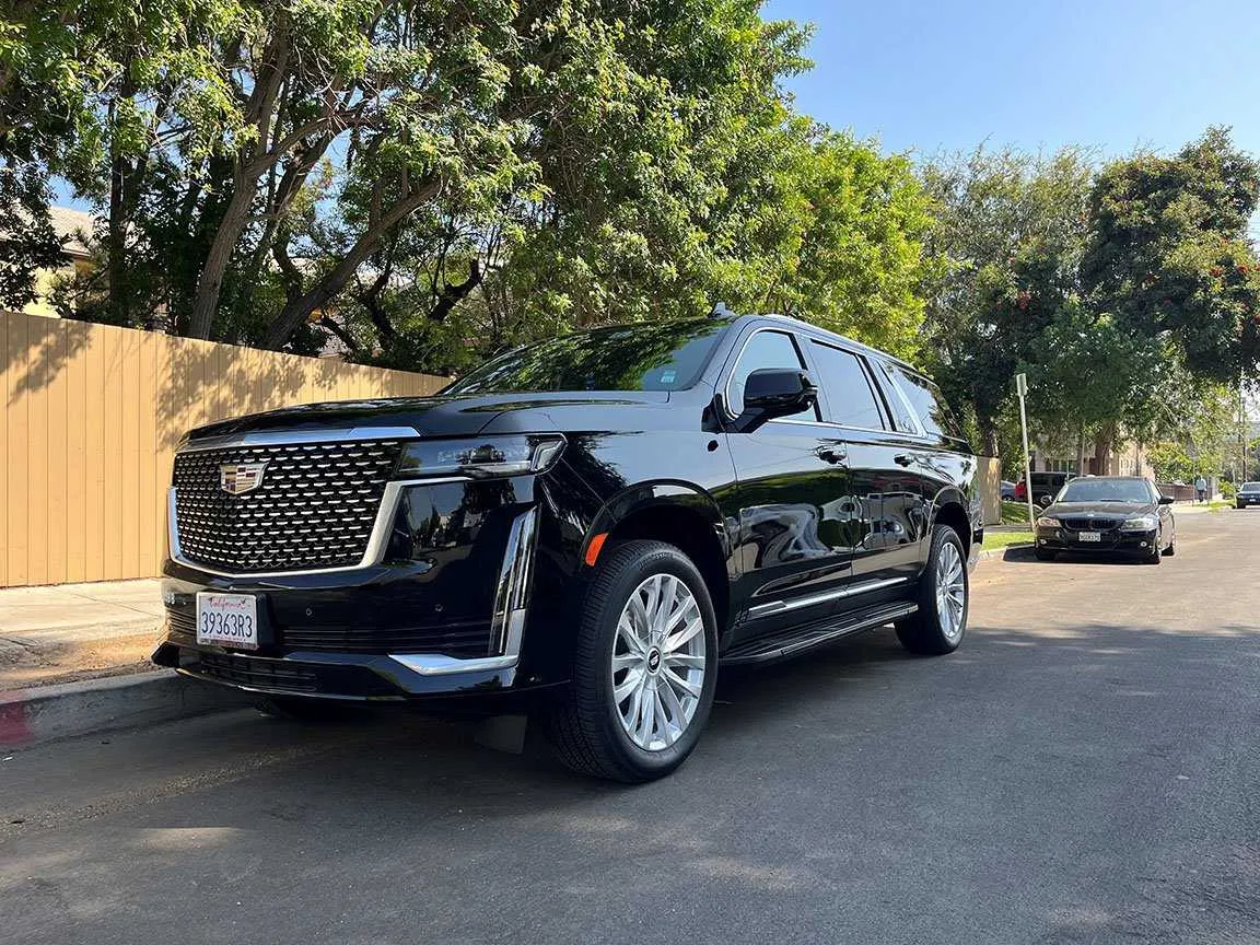 Black Cadillac Escalade with running boards for cadillac escalade limo in Los Angeles, CA