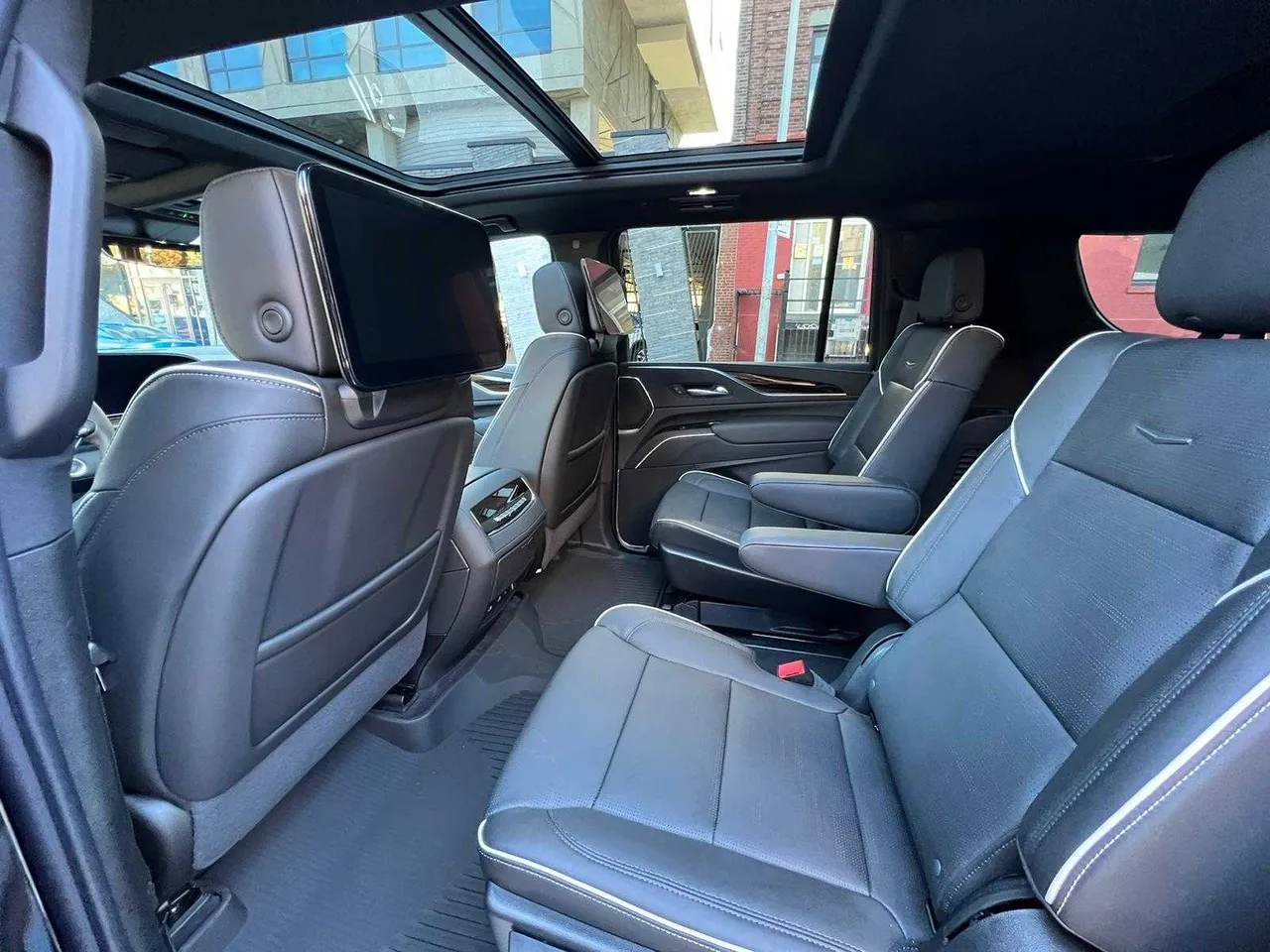 Cadillac Escalade interior with captain's chairs and rear-seat entertainment screens, photo 4 for airport transfers in Santa Clara County, CA