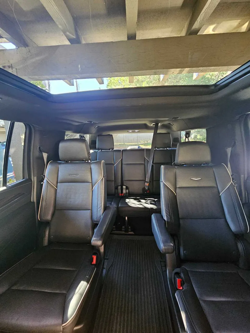 Cadillac Escalade interior with captain's chairs for airport transfers in Miramonte, CA