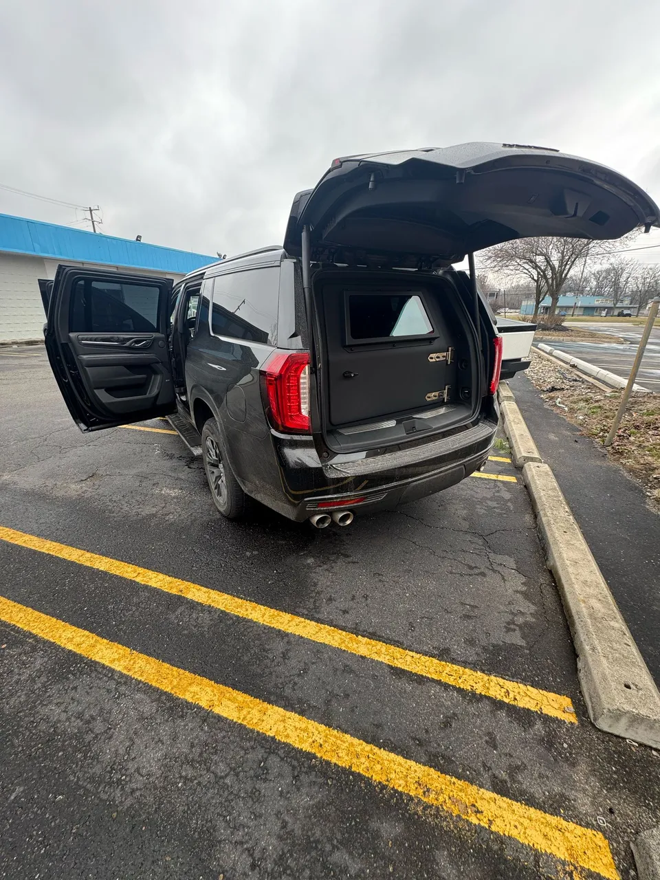 Black Cadillac Escalade — Advertised Armored Rental, photo 4 for airport transfers