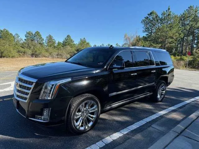 Black Cadillac Escalade (Big Daddy Caddy) with running boards for airport transfers