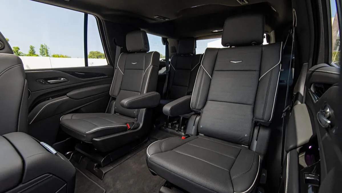 Cadillac Escalade ESV interior with captain's chairs for airport transfers