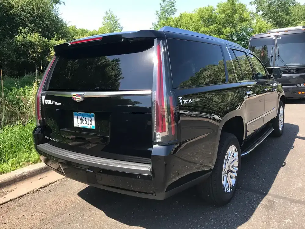 Black Cadillac Escalade exterior with tinted windows for cadillac escalade limo in Saint Paul, MN Black Cadillac Escalade exterior with tinted windows for cadillac escalade limo in Saint Paul, MN