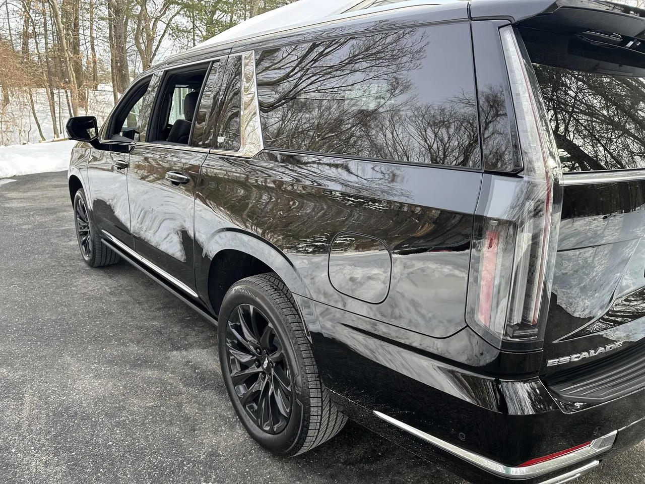 Black Cadillac Escalade ESV with tinted windows for airport transfers Black Cadillac Escalade ESV with tinted windows for airport transfers