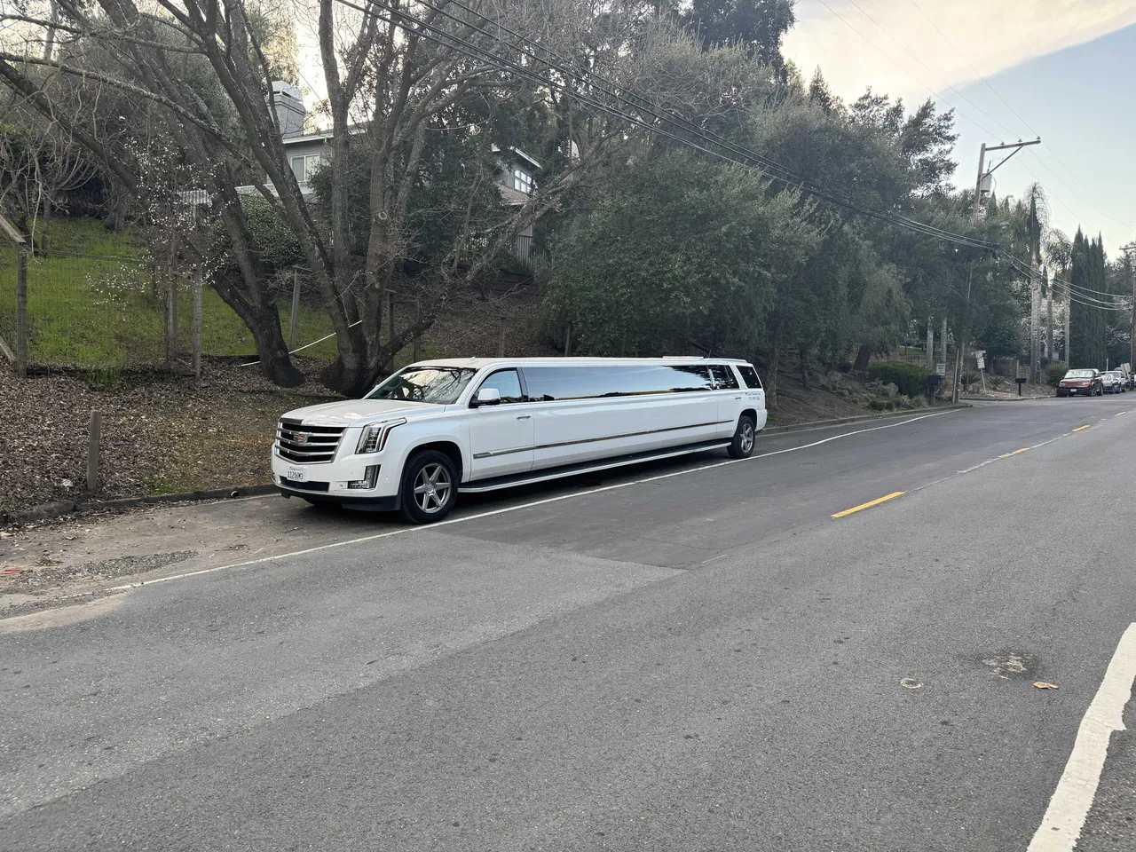 White Cadillac Escalade Limo
