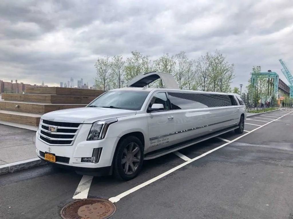 White Cadillac Escalade Limousine for prom car rental in Leominster, MA