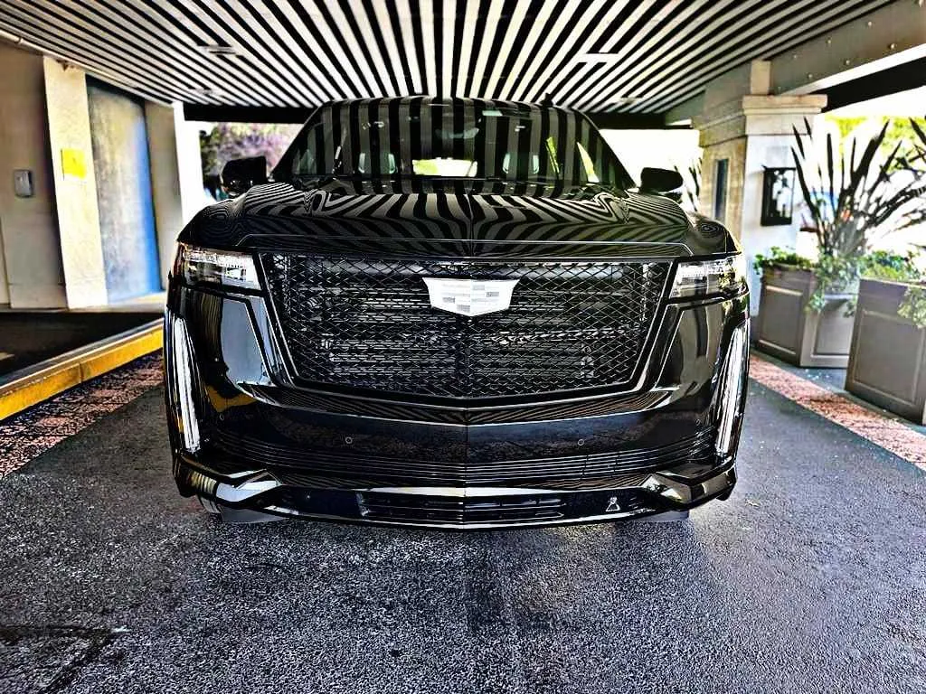 Black Cadillac Escalade Sport Luxury SUV exterior for luxury car rental in Colusa County, CA Black Cadillac Escalade Sport Luxury SUV exterior for luxury car rental in Colusa County, CA