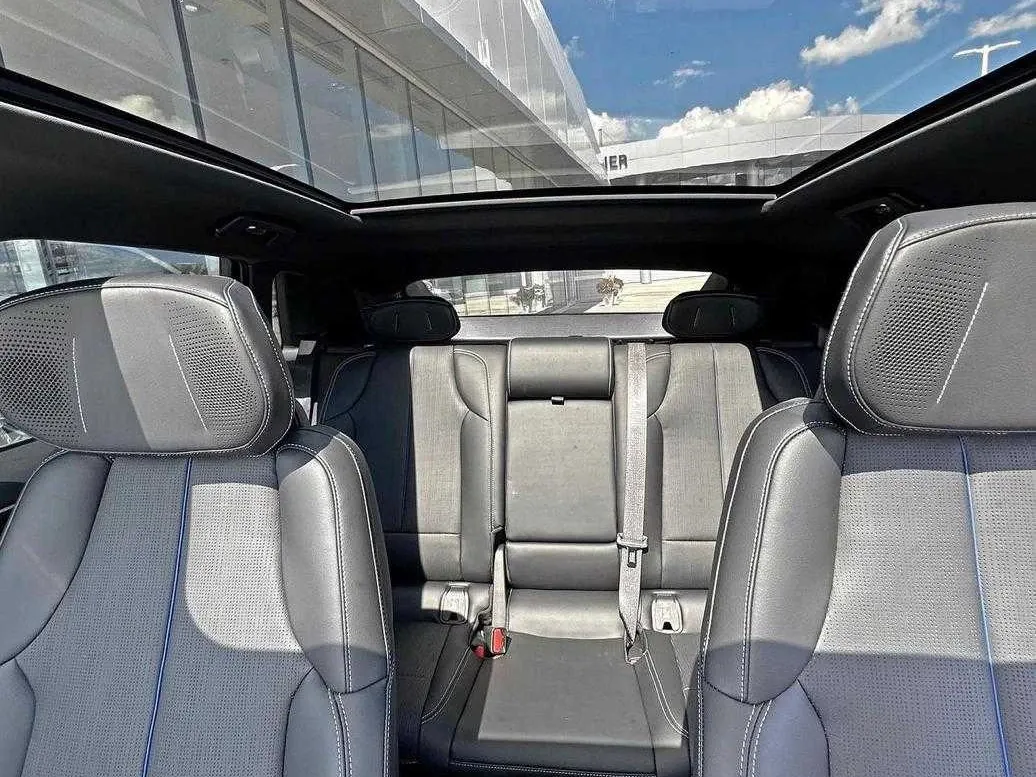 Black Cadillac Lyriq, photo 2 for airport transfers Black Cadillac Lyriq, photo 2 for airport transfers