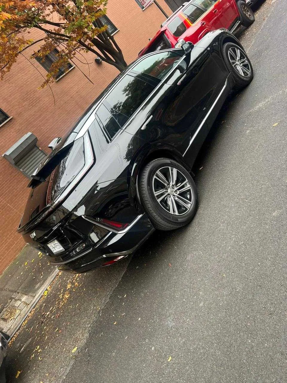 Black Cadillac Lyriq exterior for airport transfers Black Cadillac Lyriq exterior for airport transfers