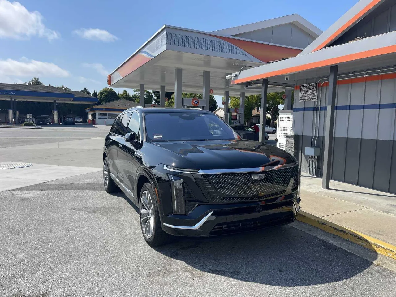 Black Cadillac Vistiq Sport Luxury SUV exterior for black car service in Sacramento County, CA Black Cadillac Vistiq Sport Luxury SUV exterior for black car service in Sacramento County, CA