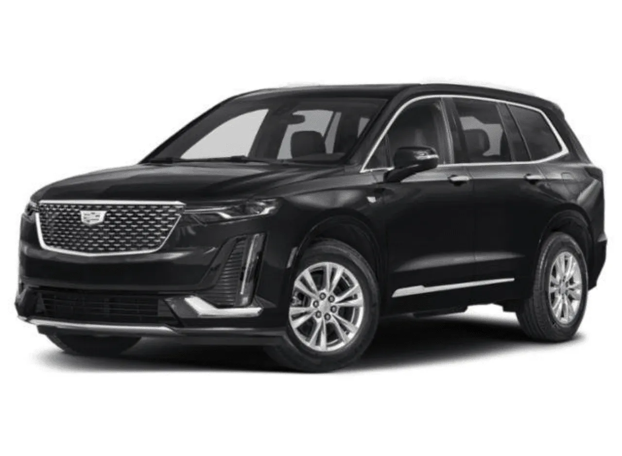Black Cadillac XT6 Luxury Midsize for airport transfers